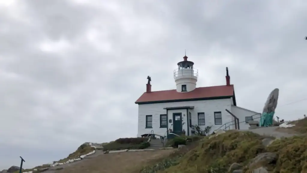 Battery Point Lighthouse Crescent City California white building with red roof and tower